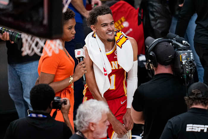 Trae Young smiles during a post-game interview in Atlanta.
